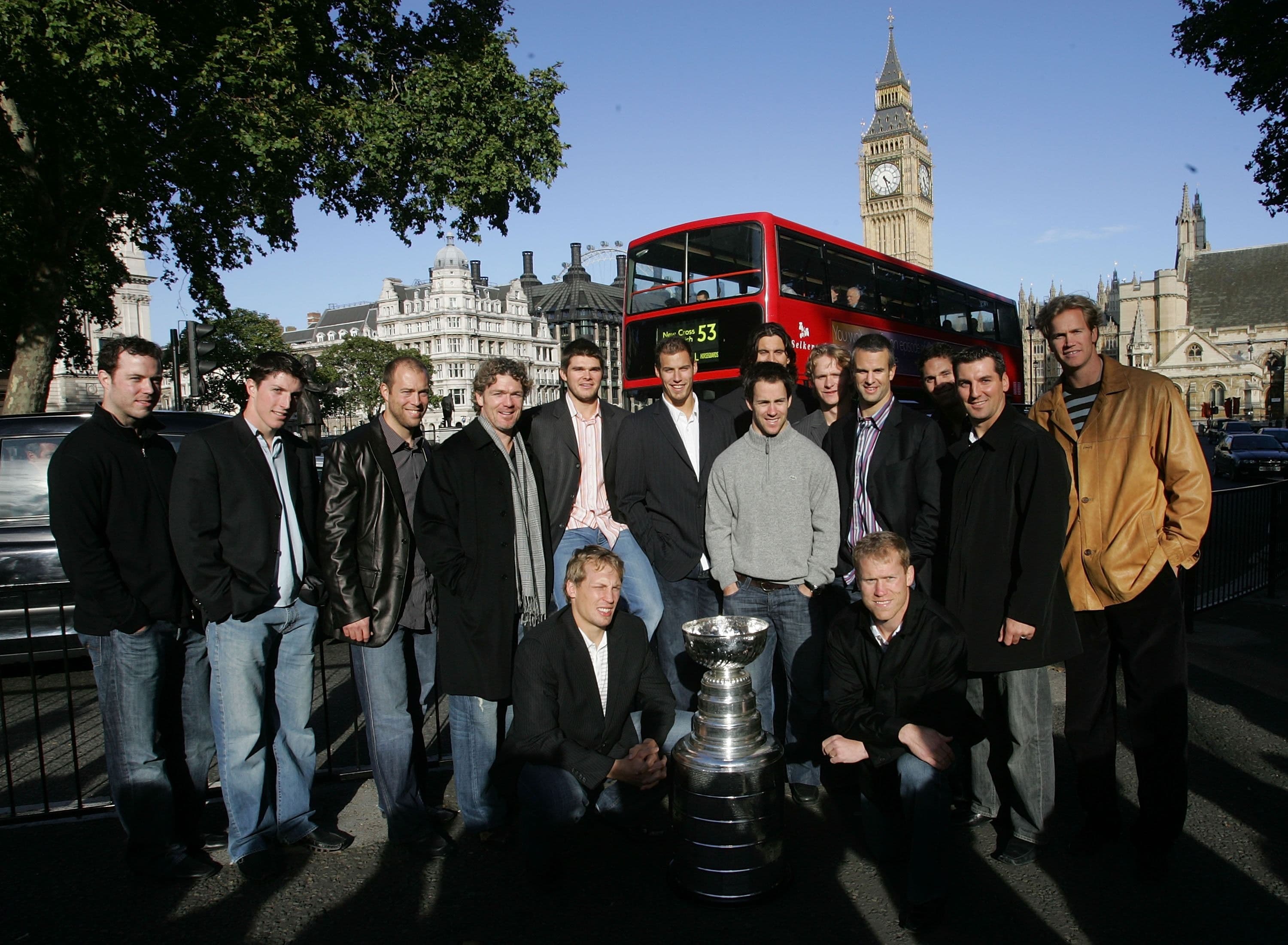 NHL Players surrounding the Stanley Cup in England