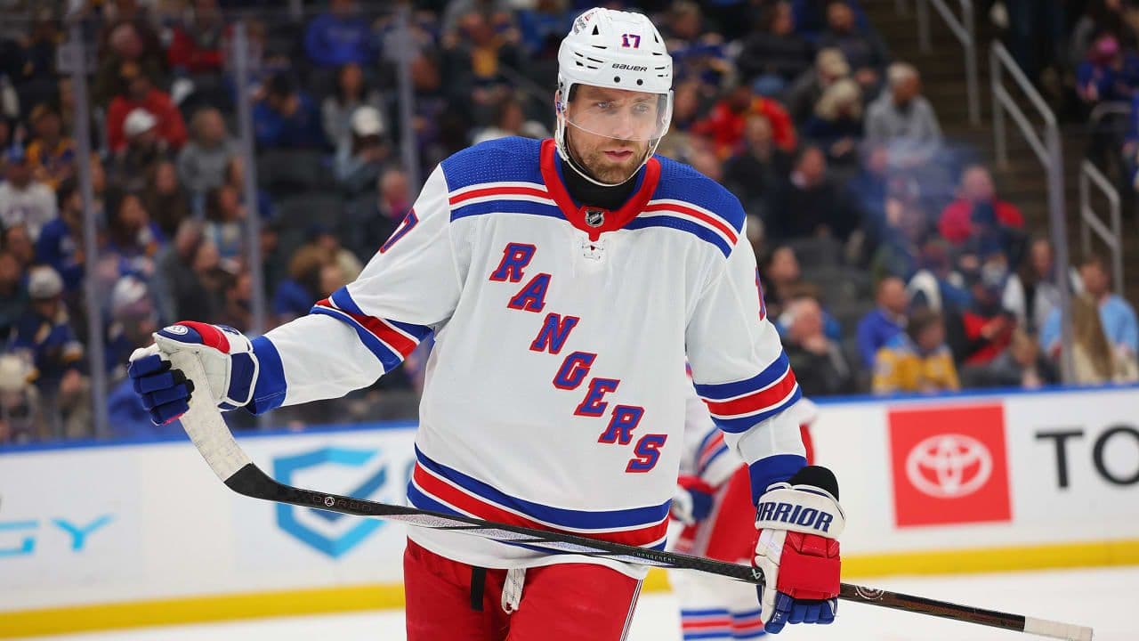 Blake Wheeler of the New York Rangers on the ice during a game, holding his stick mid-shift.
