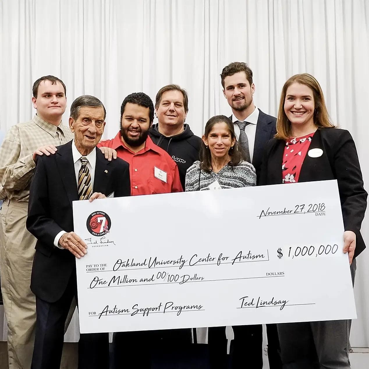 Ted Lindsay presenting $1M cheque to Oakland University Centre for Autism