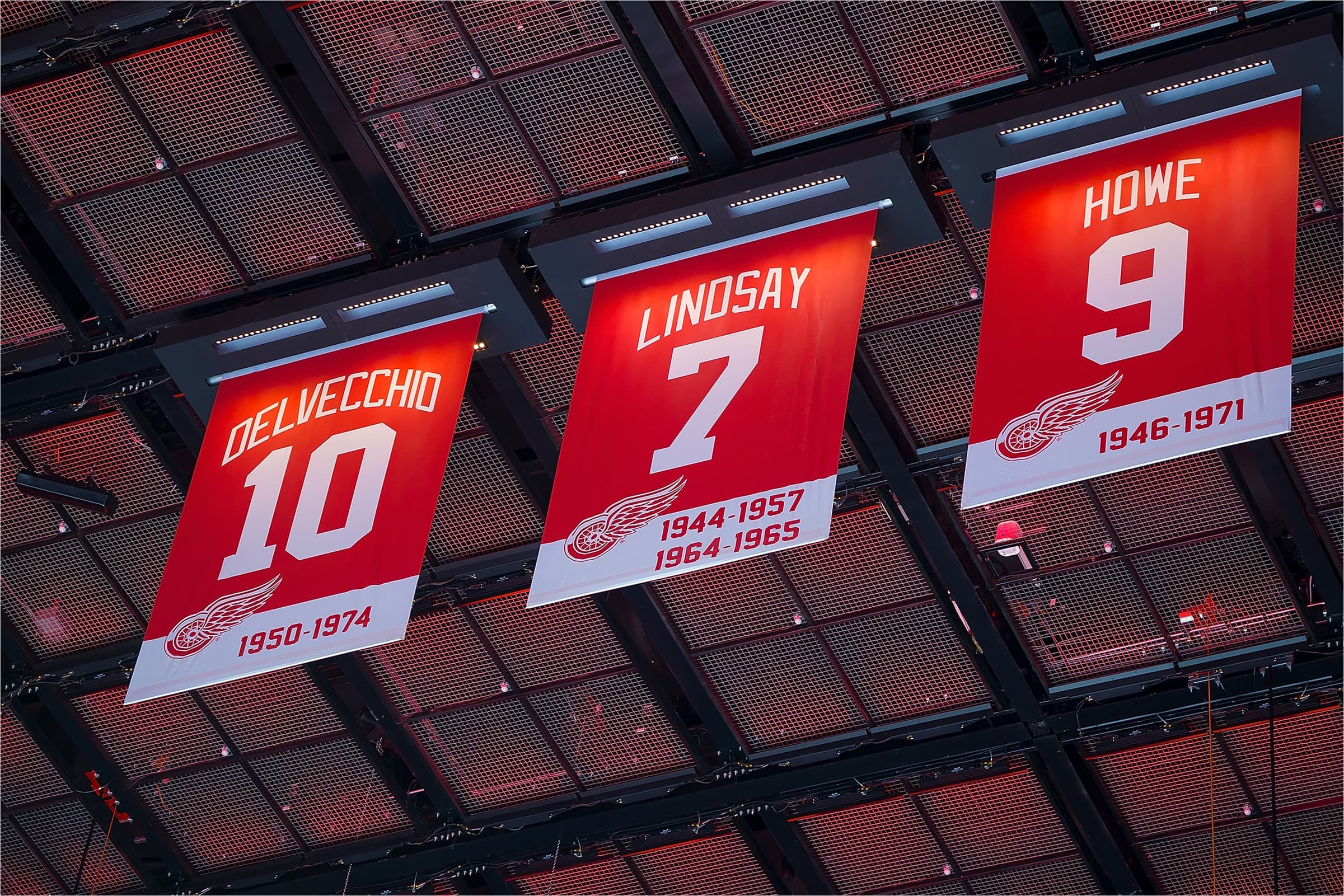 Banners honouring Detroit players Delvecchio, Lindsay, and Howe.